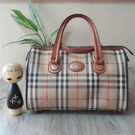 how much is a vintage burberry purse worth|older model burberry handbags.